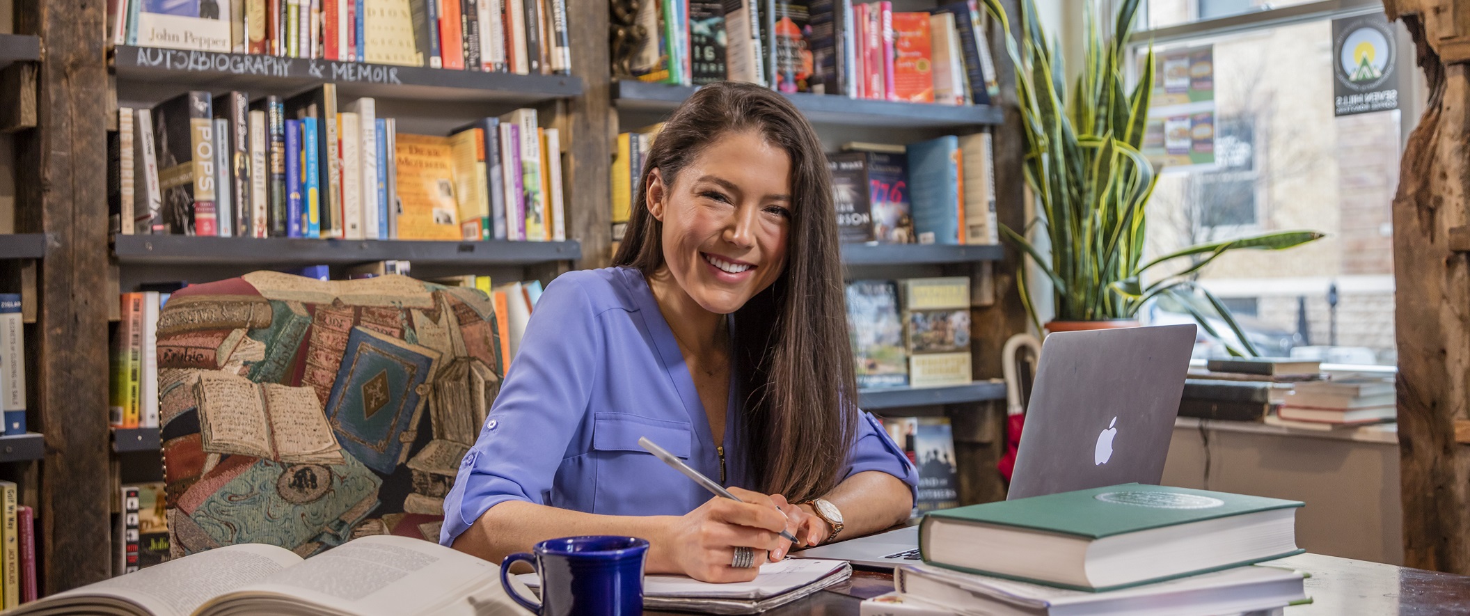 woman on laptop in library